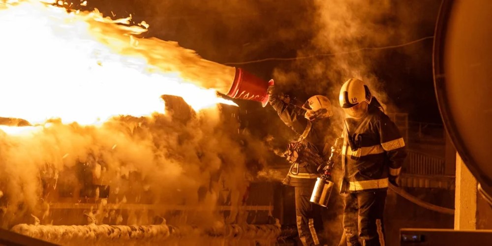 Рятувальники ліквідовують наслідки удару на території порту в Одеській області після ракетної атаки 10 липня