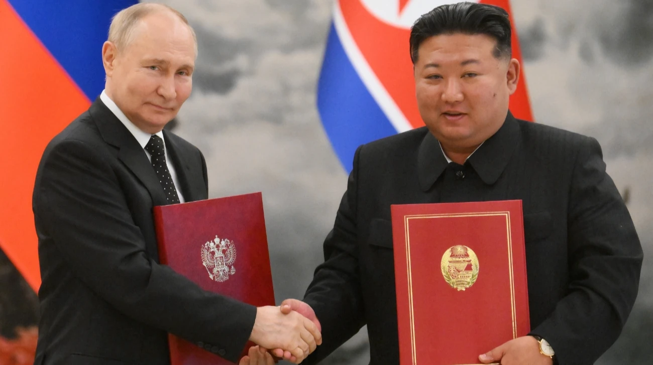 Кім Чен Ин і Володимир Путін під час офіційної зустрічі, фото KCNA via REUTERS